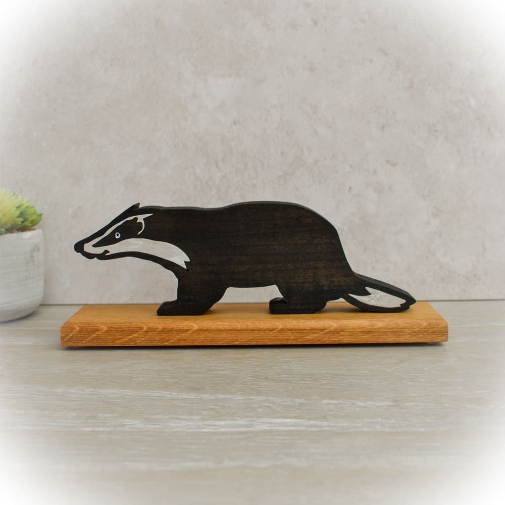 Badger Ornament made from stained wood.