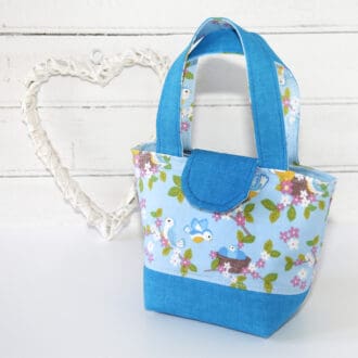 childs blue toy tote bag in baby birds print