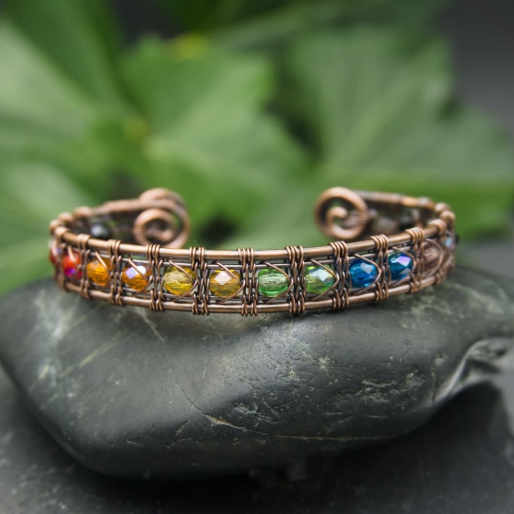 copper wire woven cuff with rainbow coloured beads by oruki design