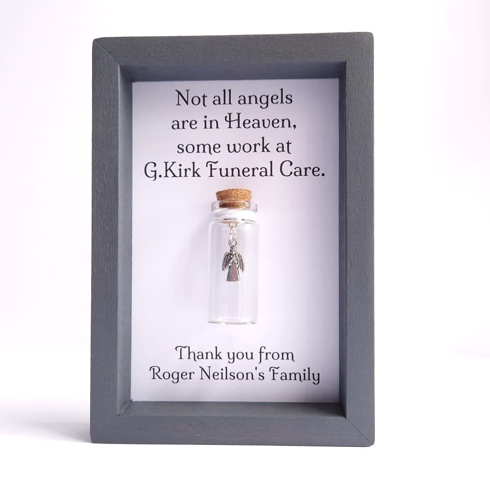 Funeral service thank you gift. Angel charm in a miniature glass bottle with a framed personalised quote