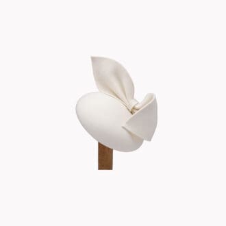 Felt cocktail hat with large bow trim in ivory