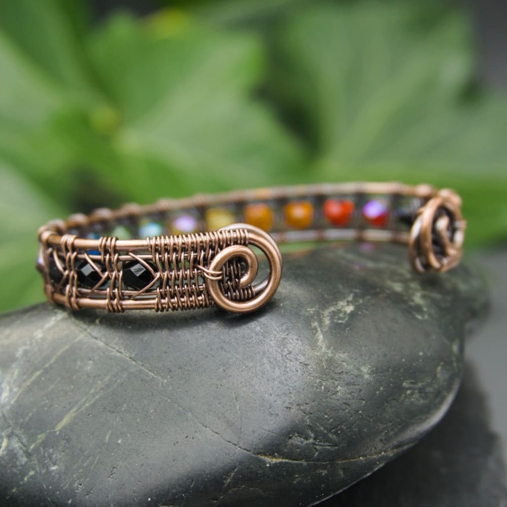 wire weave copper cuff with spiral ends by oruki design
