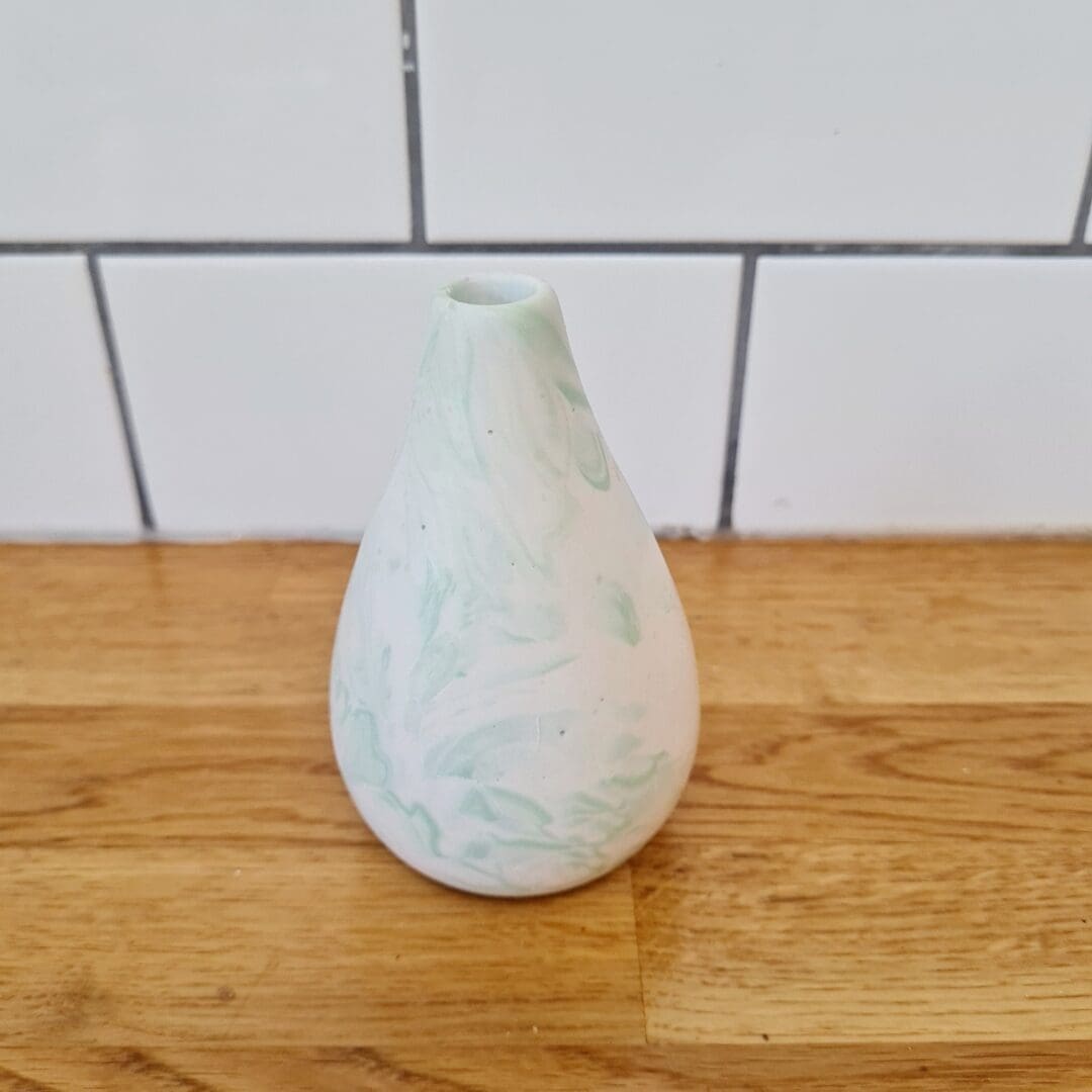 Green marble effect bud vase