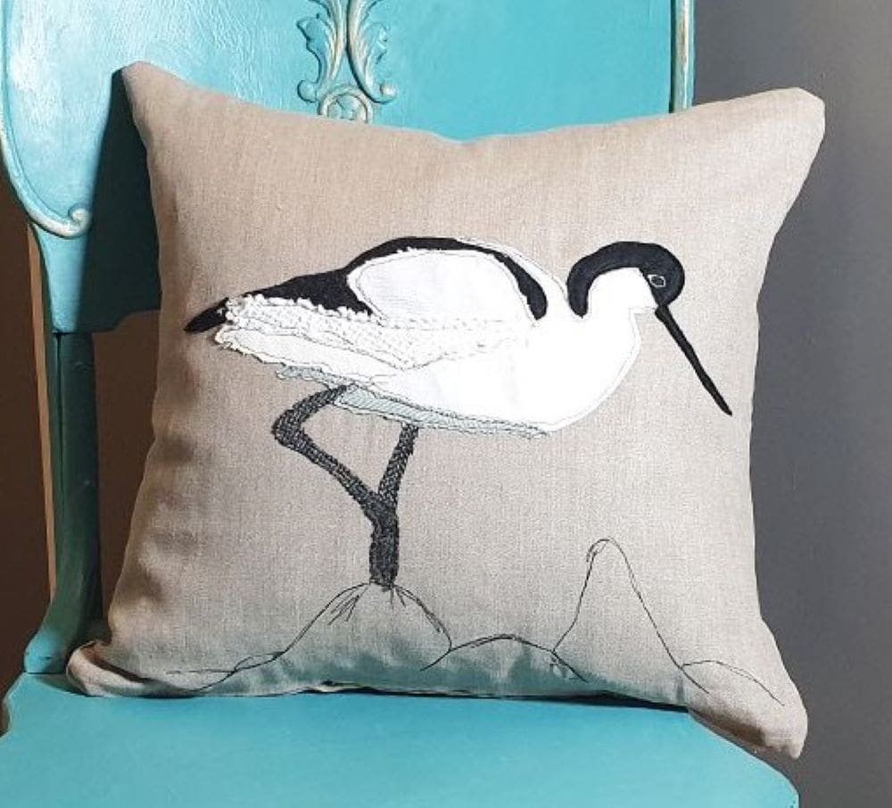 Appliqued Avocet linen cushion