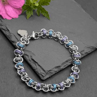 Chainmaille bracelet made in the barrel weave. made with silver coloured and matt pastel coloured aluminium rings