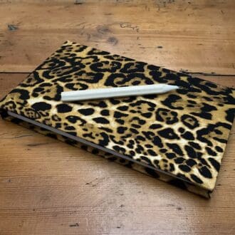 Handmade Jotter Notebook with plain paper covered in a Leopard print fabric