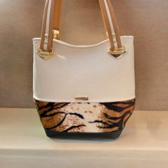 shaped handbag in cream faux leather and textured print