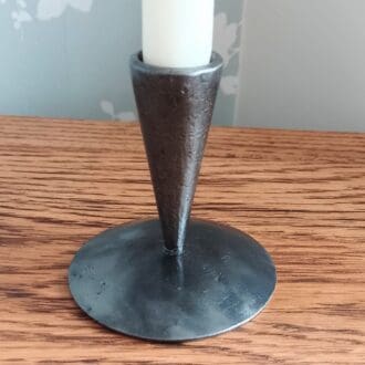 Metal candle holder, hand forged by a blacksmith.