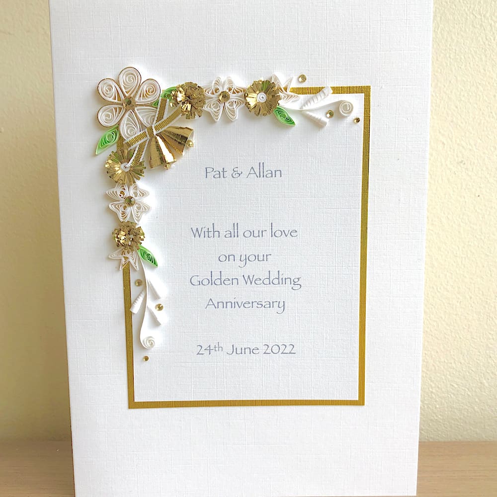 Handmade golden 50th wedding anniversary card with quilled flowers