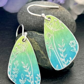 green and blue engraved earrings