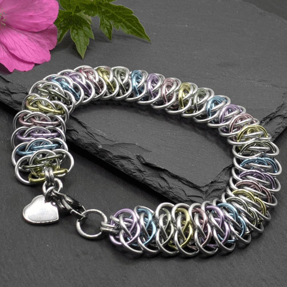 Chainmaille bracelet made in the viperscale weave, made with silver coloured and pastel coloured aluminium rings