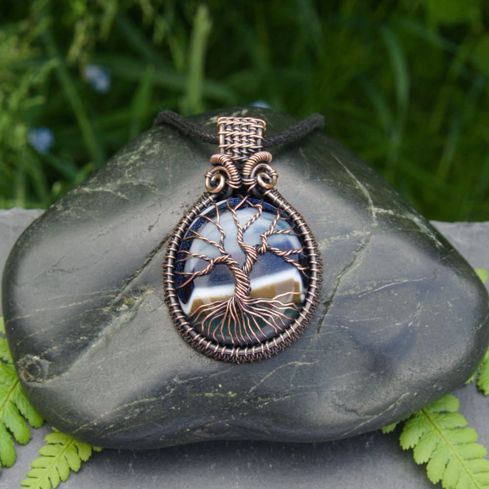 Copper wire weave pendant on striped fused glass pebble by Oruki Design