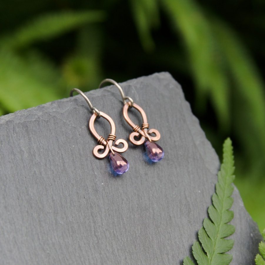 Handmade copper drop earrings with purple lustre beads by Oruki Design