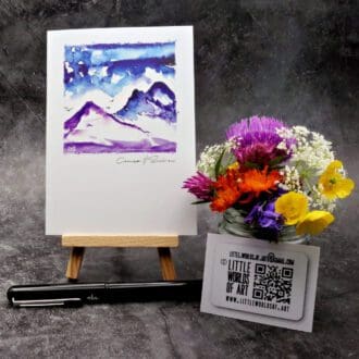 Image showing an A6 size greetings card, blank inside, on a small easel displaying a view of Canisp & Suilven