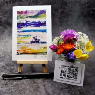 Image showing an A6 size greetings card, blank inside, on a small easel displaying a fishing boat out on the sound followed by gulls