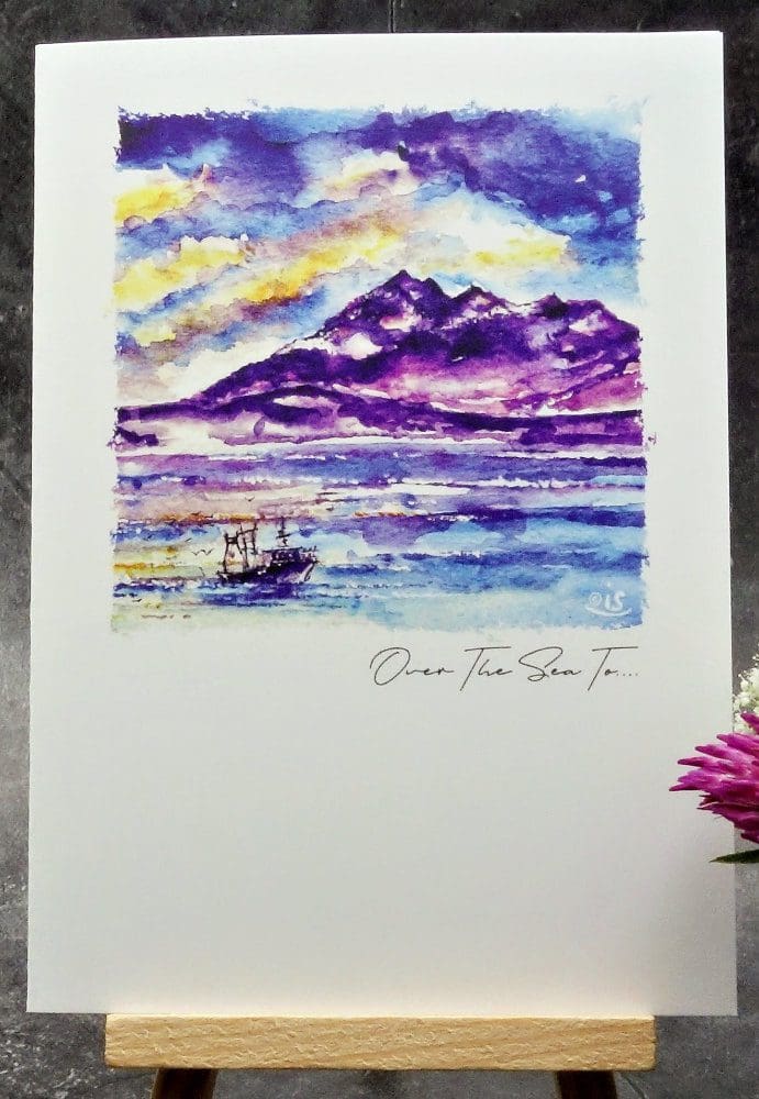 Larger image showing an A6 size greetings card, blank inside, on a small easel displaying a view of from Sleat (Tarskavaig roughly!) to The Cuillins (Sggur Alasdair...roughly!)