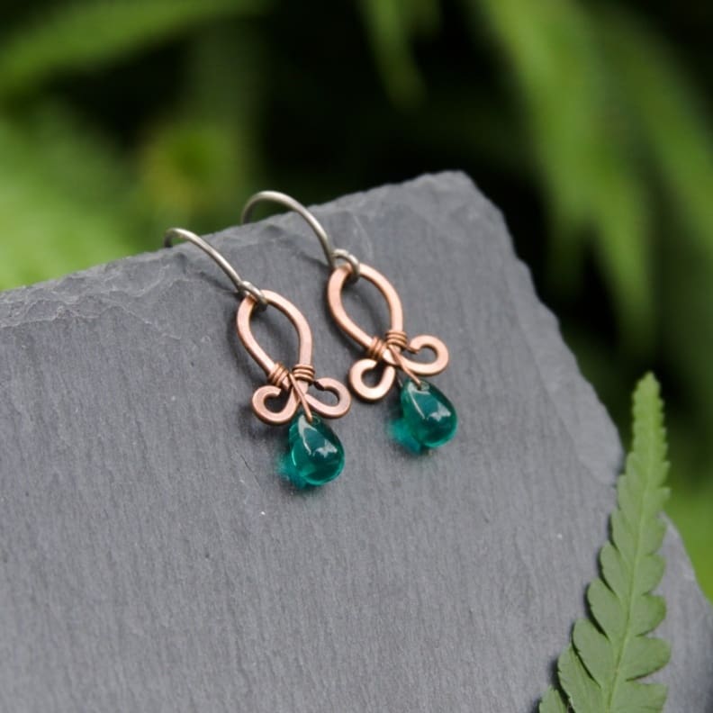 Small copper drop earrings with teal glass beads by Oruki Design