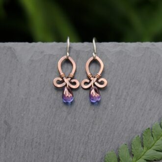 Small handmade copper earrings with purple beads by Oruki Design