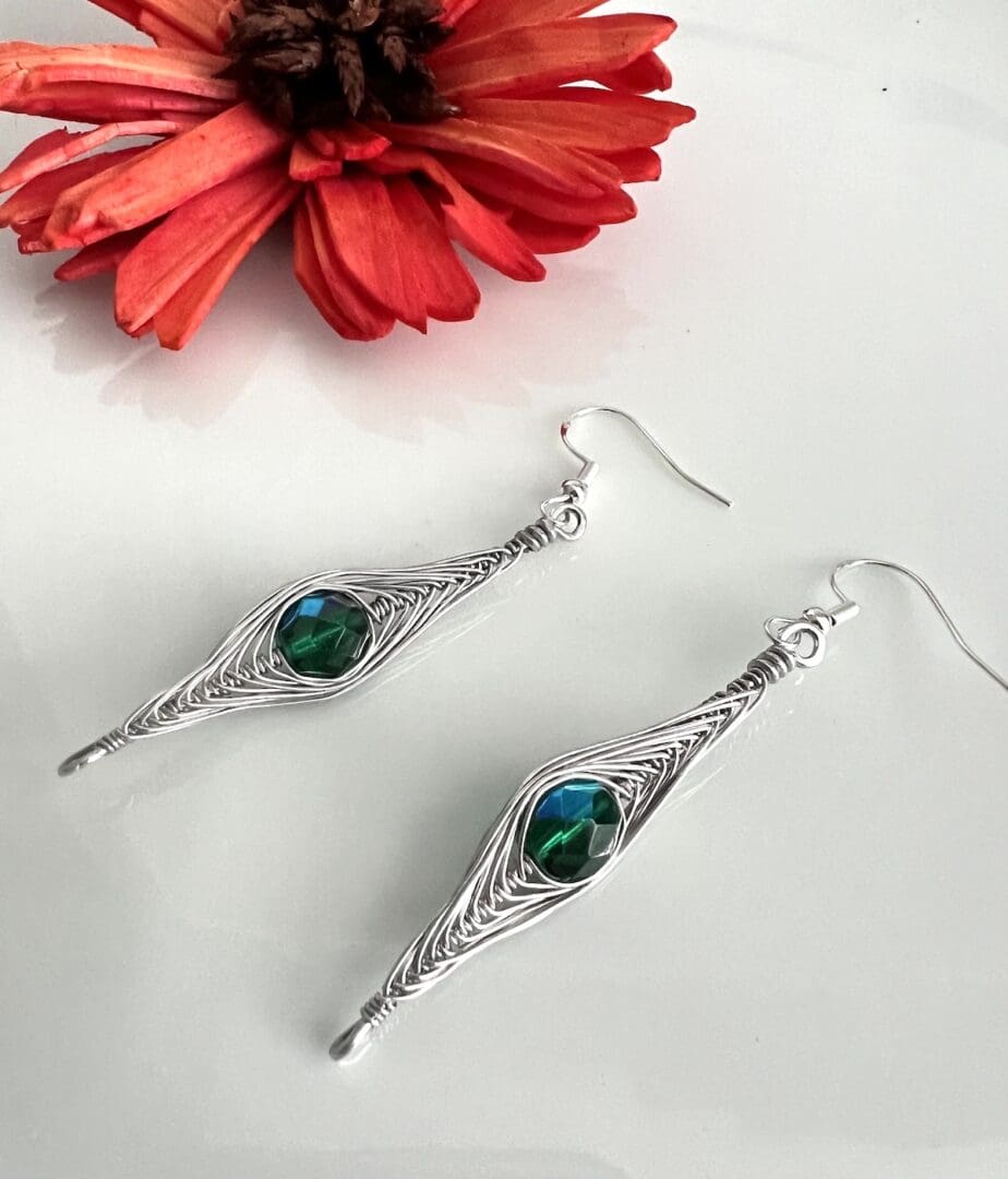 Aluminium Herring Earrings with Green Lustre Beads