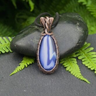 Copper wire wrapped blue fused glass pendant by Oruki Design