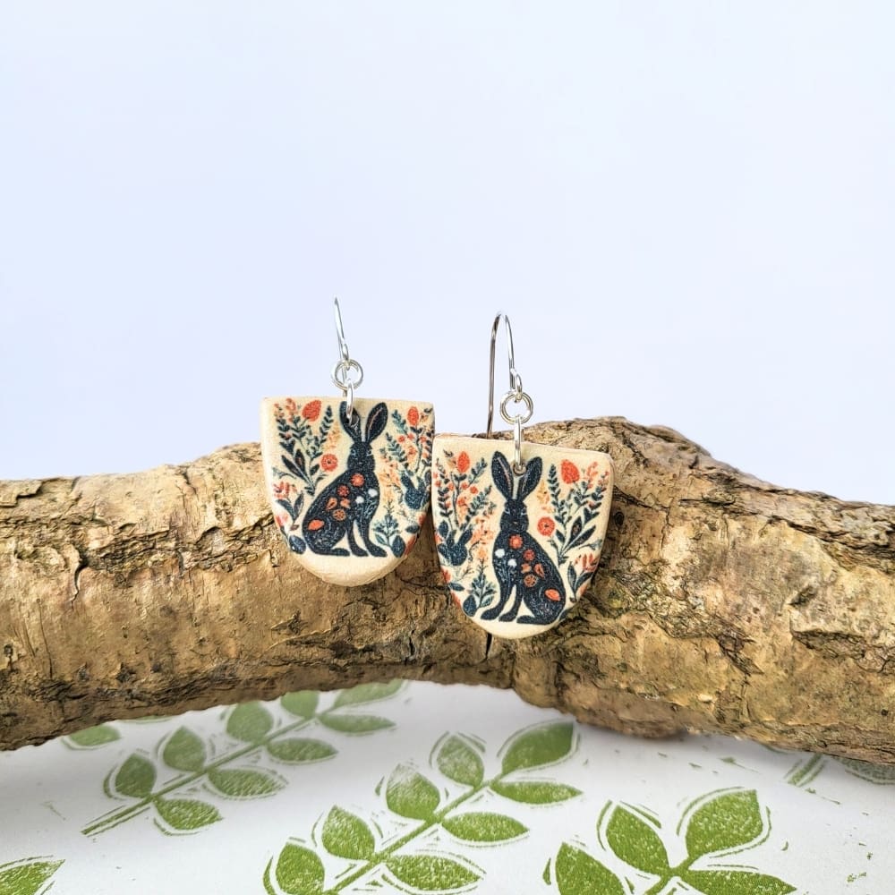 Arch shaped folk art hare print dangle earrings