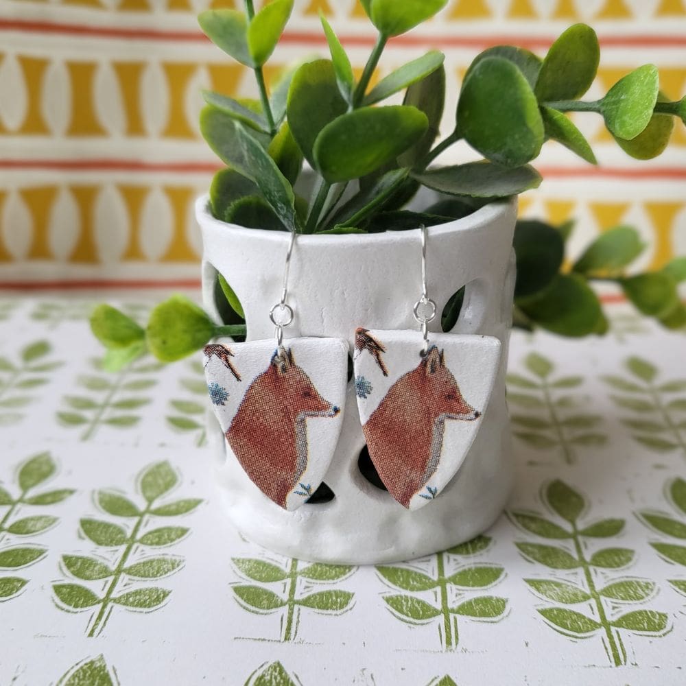 Dangly earrings with a fox print