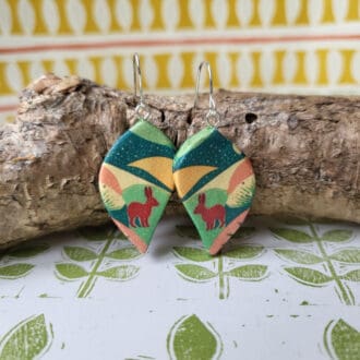 Dangle earrings with a hare in fields print