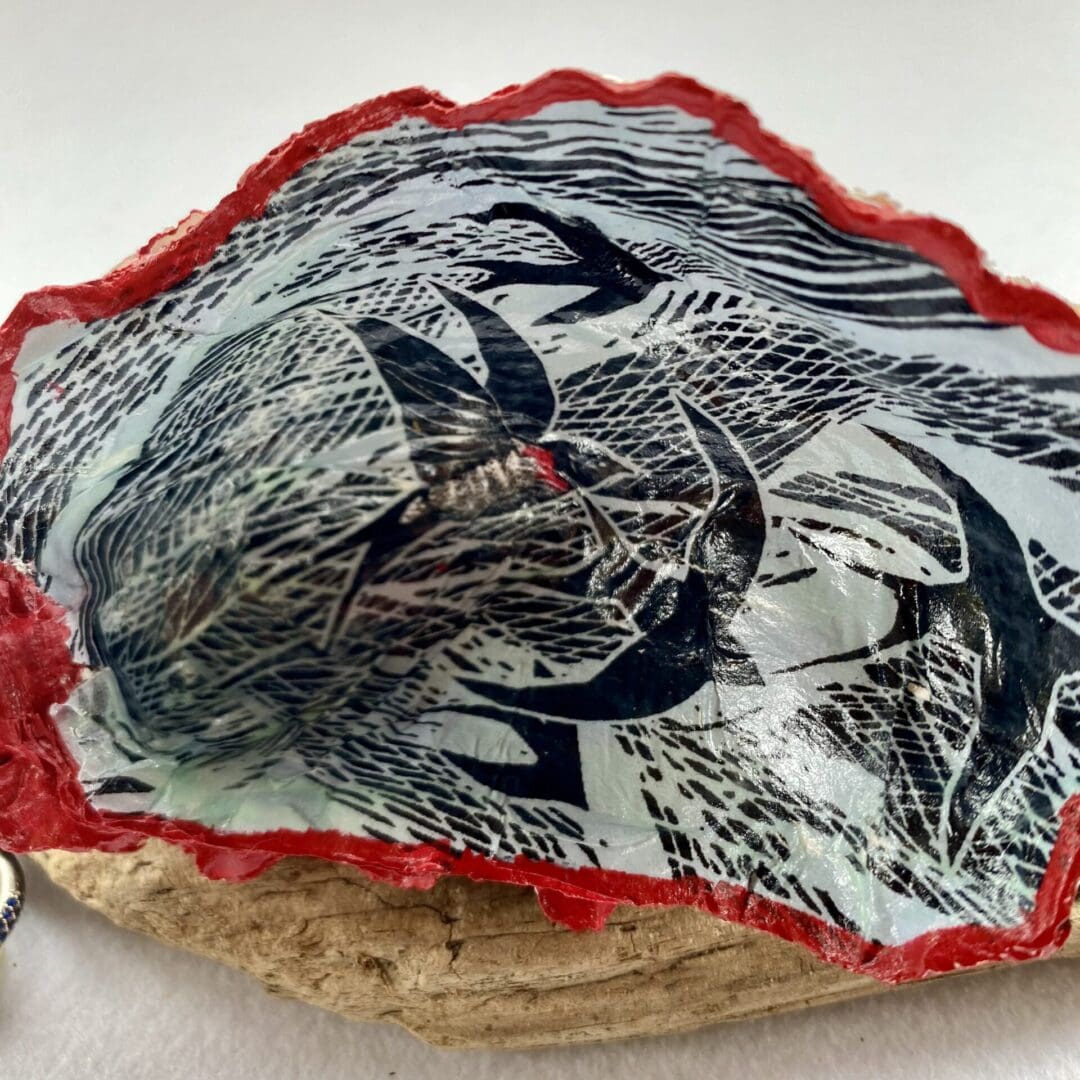 Decoupaged shell birds