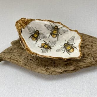 Decoupaged shell with bees