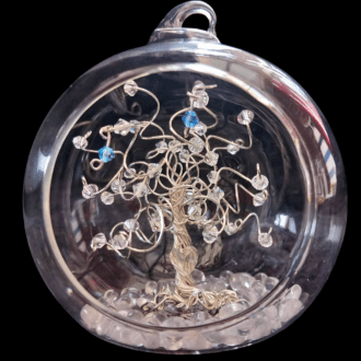 8cm glass open fronted bauble with a silver wire tree set into it on a glass bauble base. There is a clear crystal heart wired into the trunk and the branches are decorated with clear crystals, plus birthstone drops in aquamarine and sapphire.