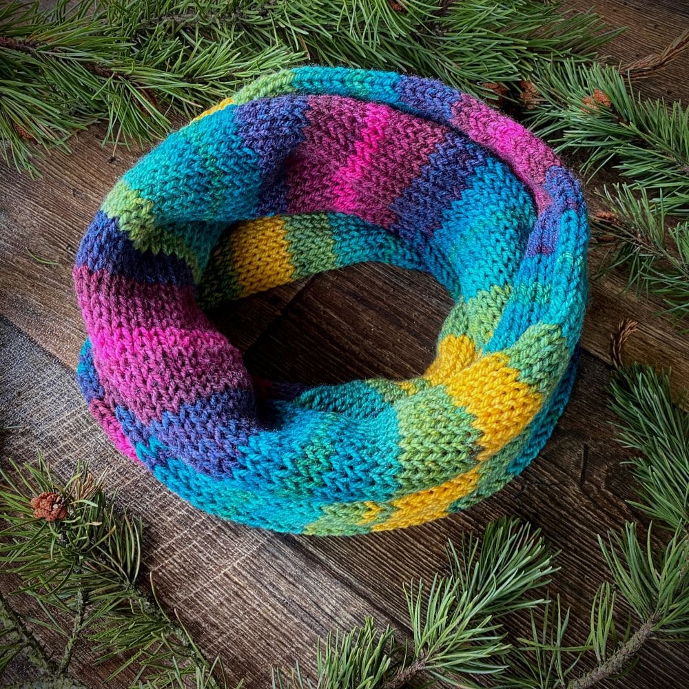 Knitted vegan infinity scarf in bright rainbow shades