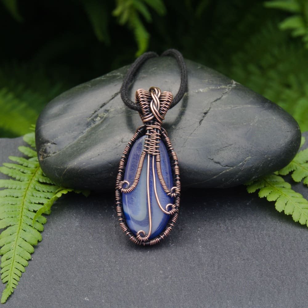 Back of a handmade copper wire wrapped pendant by Oruki Design