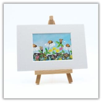 A mounted daisy painting