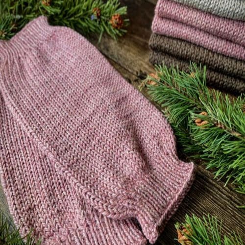 Hand knitted chunky slouchy leg warmers in a dusk pink pure alpaca yarn