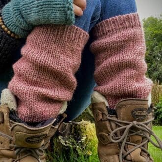 Hand knitted cosy slouch legwarmers in dusk pink pure alpaca yarn