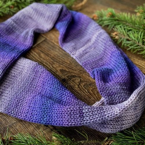 Purple rainbow vegan loop scarf in gentle colour changing stripes