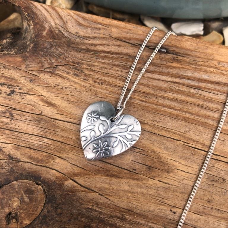 silver-flower-heart-necklace