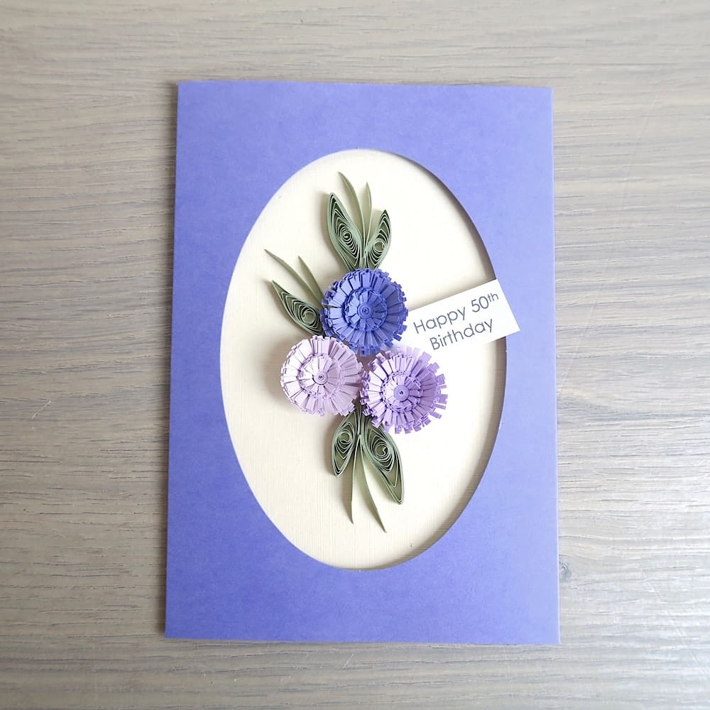 Handmade 50th birthday card with lilac quilled flowers