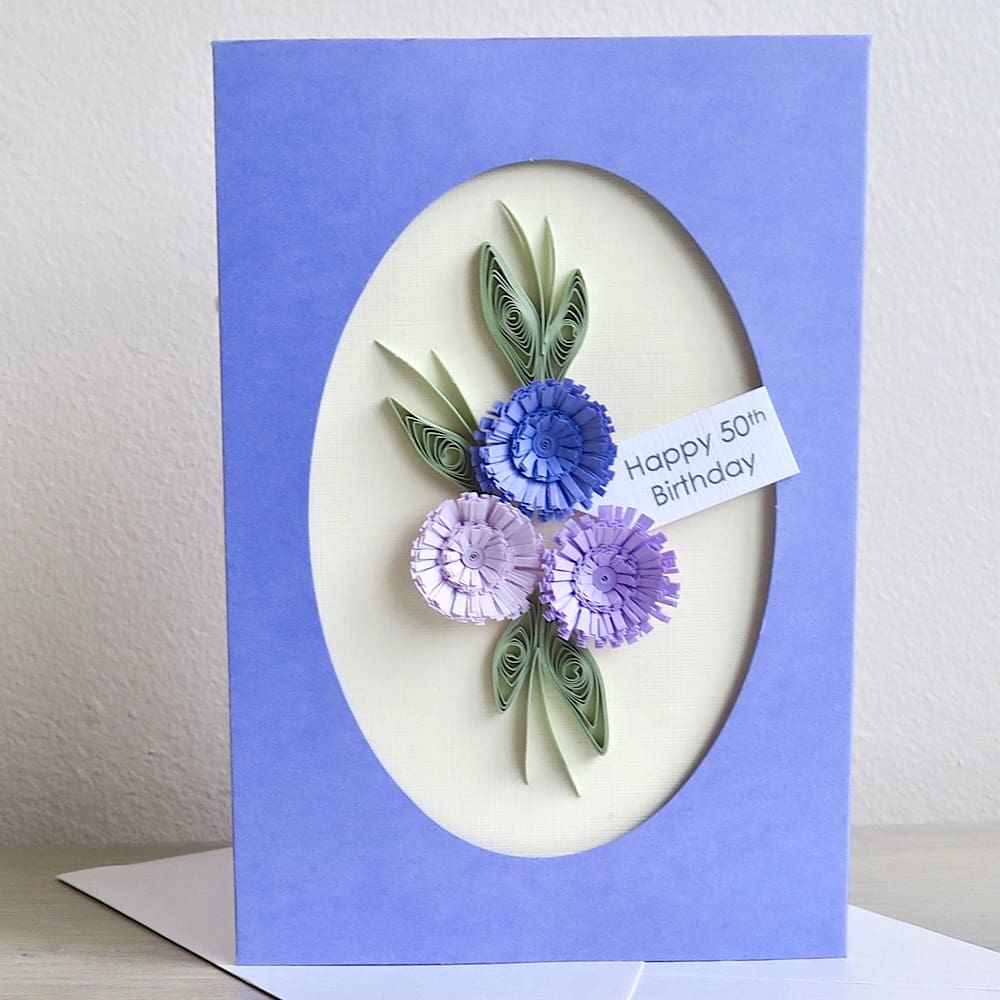 Handmade 50th birthday card with lilac quilled flowers