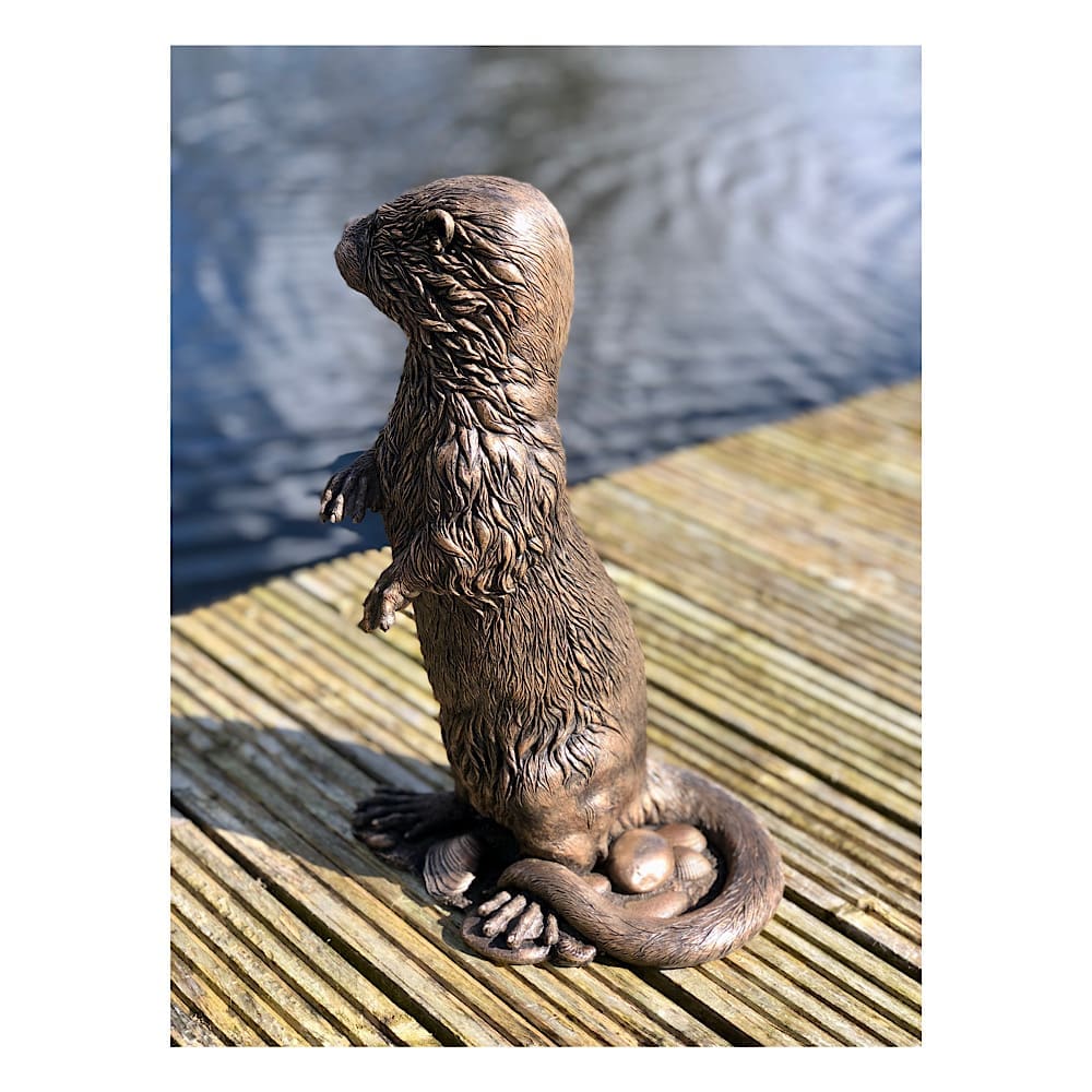 Otter sculpture in bronze