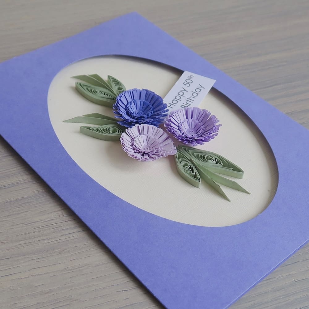 Handmade 50th birthday card with lilac quilled flowers