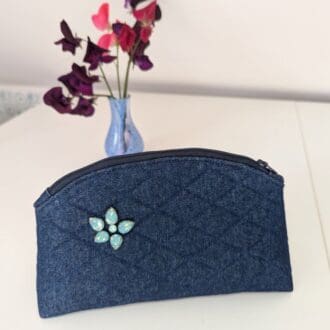 Small blue make up bag, quilted using upcycled denim