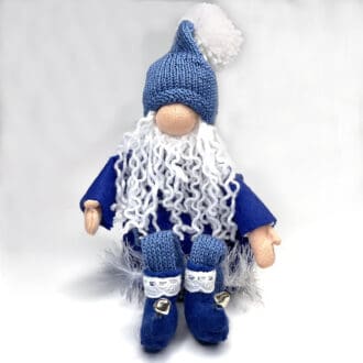 Bearded blue boy Christmas gnome decoration with knees up