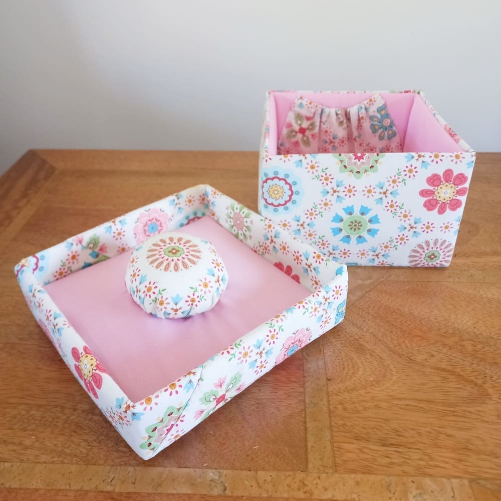 Cream fabric covered sewing box