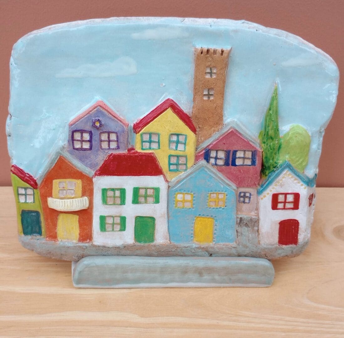 "decorative_3D_plaque _with_colourful_houses"