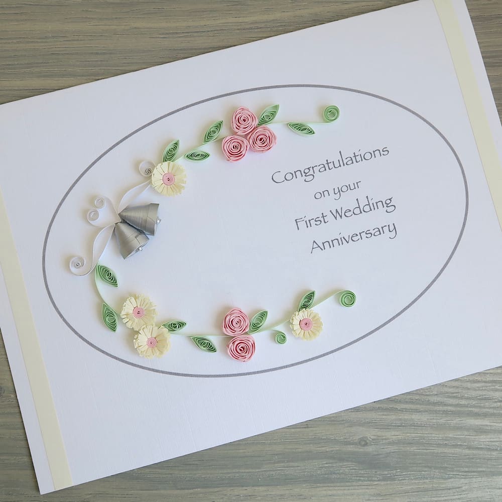 Handmade first wedding anniversary card with quilled flowers