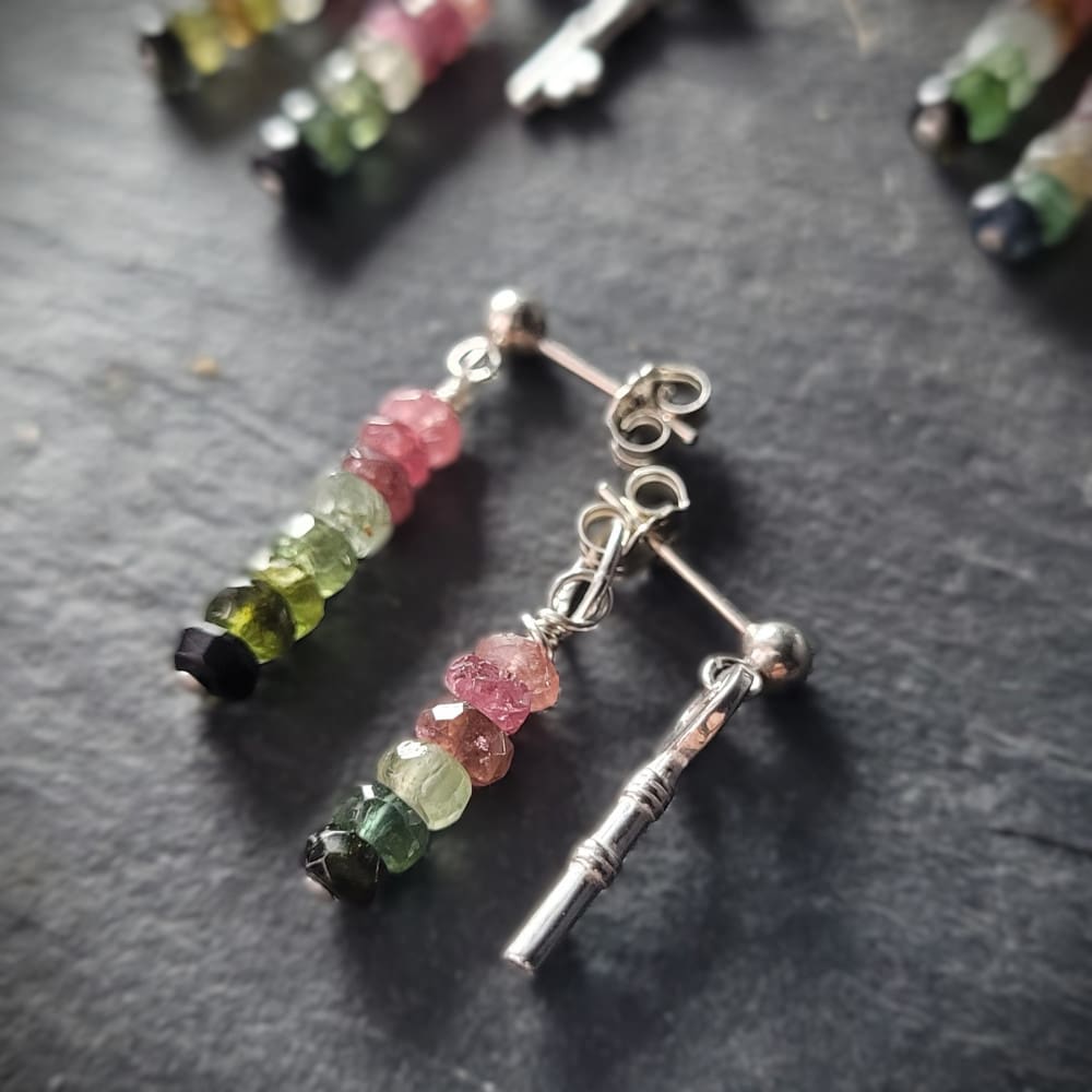 Key of Freedom Earrings. Asymmetrical earrings in sterling silver and watermelon tourmaline. One earring in the pair features a key charm as well as the multicoloured beads.