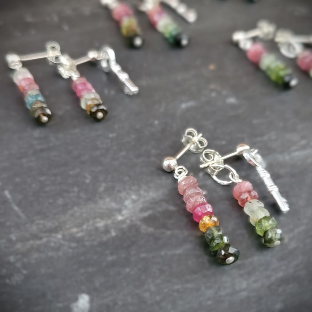 Key of Freedom Earrings. Asymmetrical earrings in sterling silver and watermelon tourmaline. One earring in the pair features a key charm as well as the multicoloured beads.