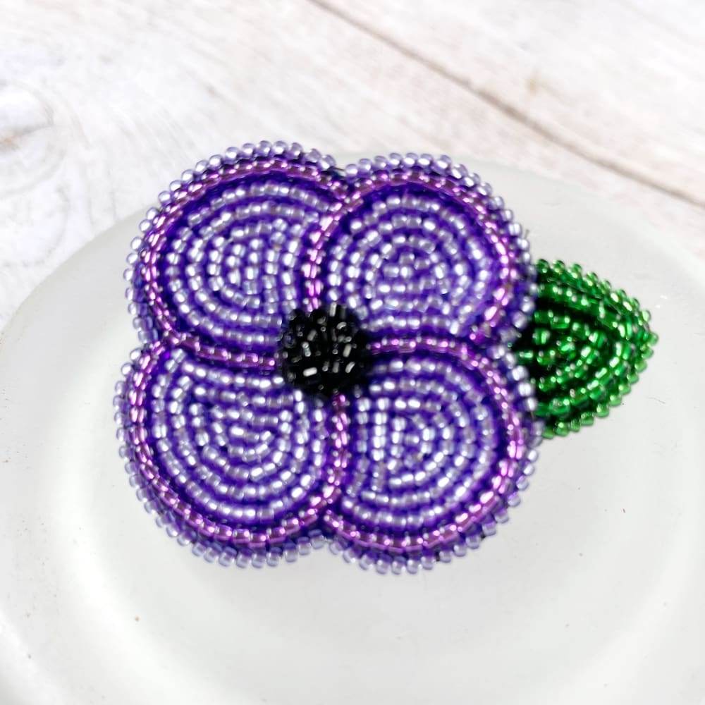 hand beaded purple poppy pin to honour those animals who served in conflict, remembrance brooch beaded by DewCatDesigns