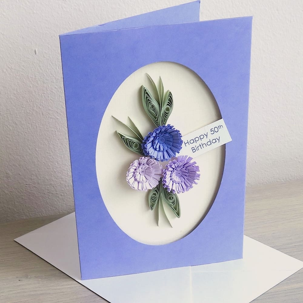 Handmade 50th birthday card with lilac quilled flowers